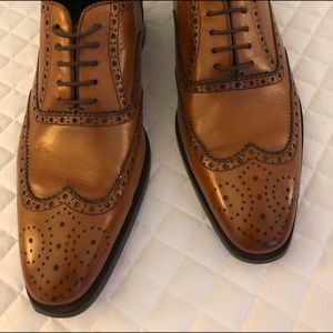 Adam Derrick dress shoes.